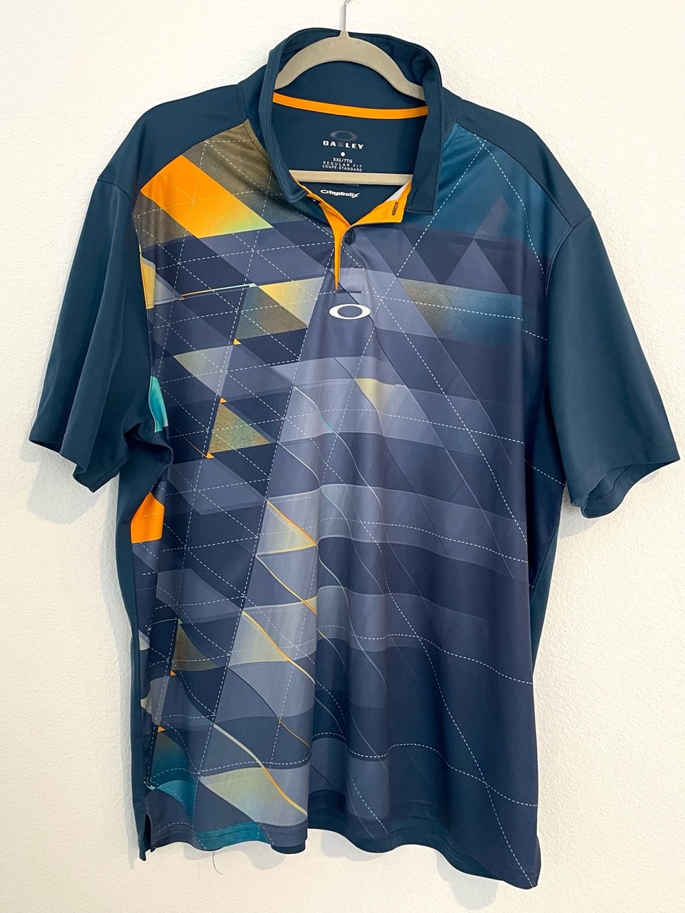 Oakley Navy Geometric Polo with Orange Trim